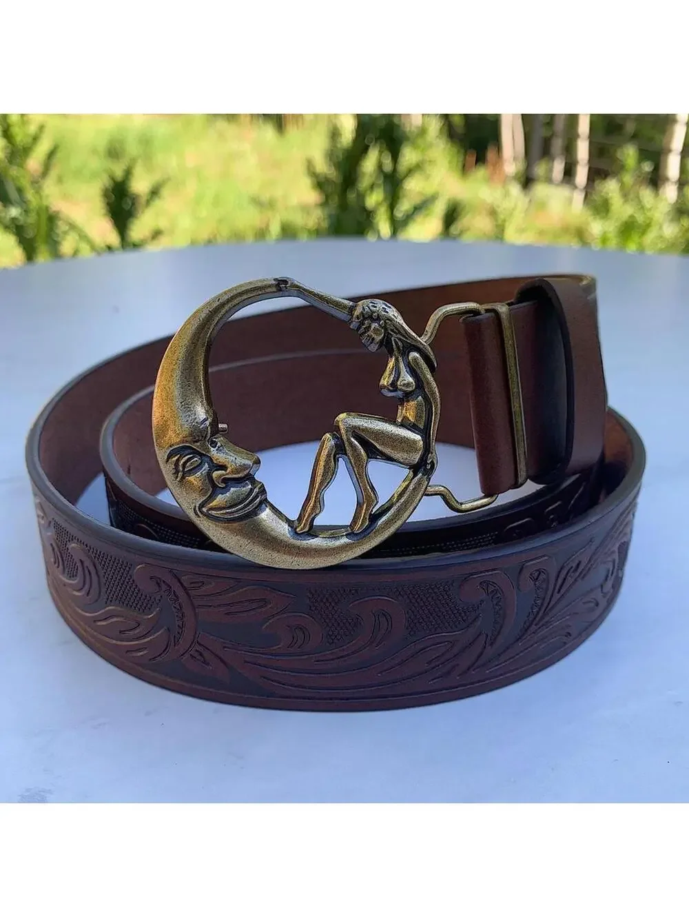 Half moon and Woman belt buckle brown belt. 44 inches length
